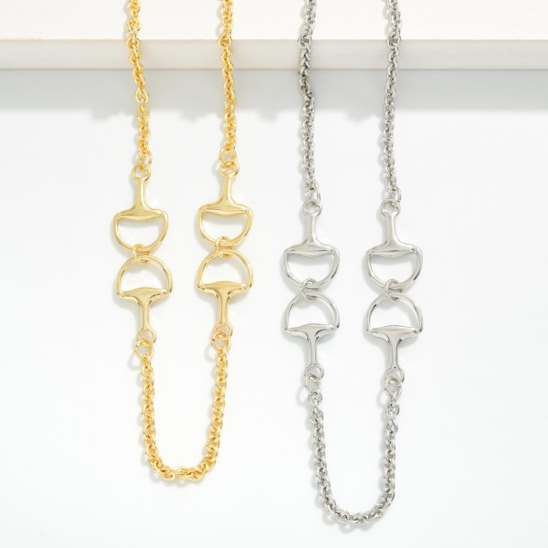 Chain Link Necklace Featuring Metal Tone Horsebit Stations 

- Gold Dipped 
- Approximately 16" L
- Extender 3" L