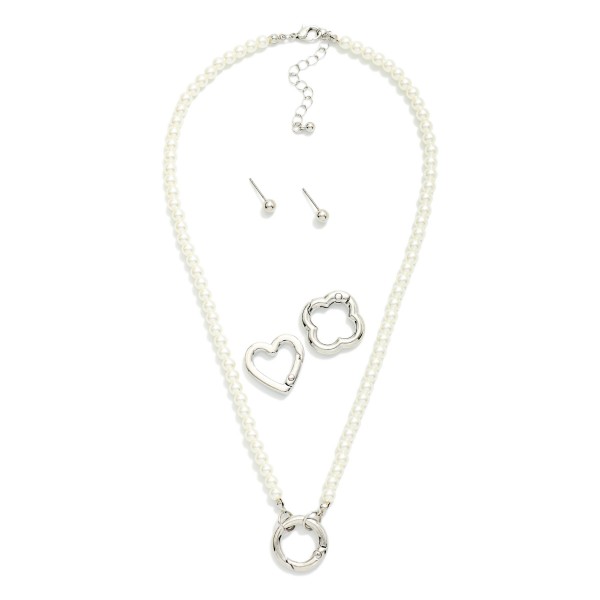 Pearl Beaded Necklace Featuring Interchangeable Metal Tone Clasp

- Includes 3 different clasps- circle, heart, & clover
- Gold Tone Ball Stud Earrings Included 
- Approximately 16" L
- Extender 3" L