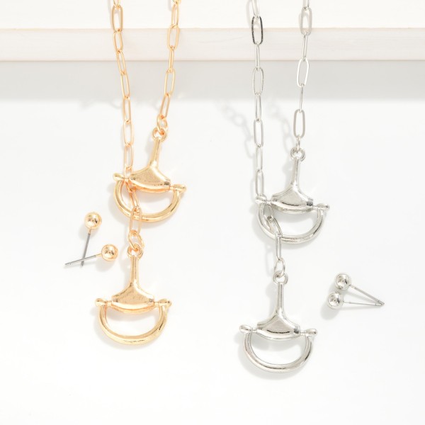 Chain Link Y Necklace Featuring Horsebit Details 

- Metal Tone Ball Stud Earrings 
- Approximately 26" L
