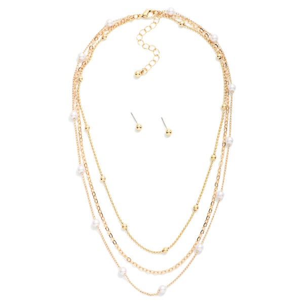 Layered Chain Link Necklace Featuring Pearl Stations 

- Metal Tone Ball Stud Earrings Included
- Approximately 16" L
- Extender 3" L