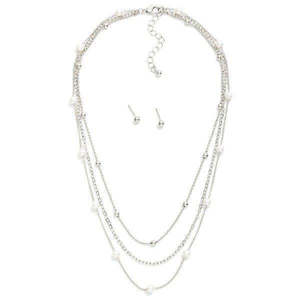 Layered Chain Link Necklace Featuring Pearl Stations 

- Metal Tone Ball Stud Earrings Included
- Approximately 16" L
- Extender 3" L