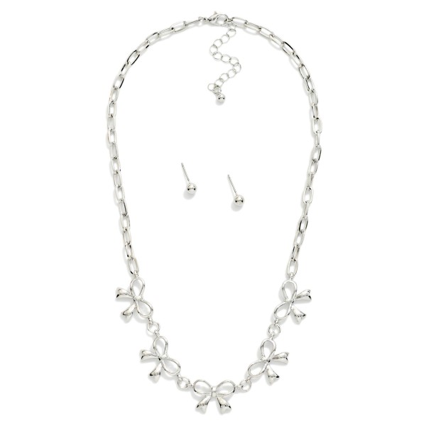 Chain Link Necklace Featuring Metal Tone Bow Stations 

- Metal Tone Ball Studs Included 
- Approximately 14" L
- Extender 3" L
