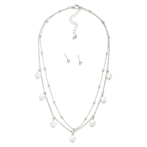 Layered Chain Link Necklace Featuring Flat Pearl Stations 

- Metal Tone Ball Stud Earrings Included
- Approximately 16" L
- Extender 3" L