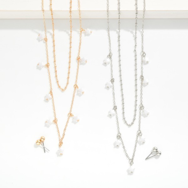 Layered Chain Link Necklace Featuring Pearl Heart Charms 

- Metal Tone Ball Studs Included 
- Approximately 16" L
- Extender 3" L