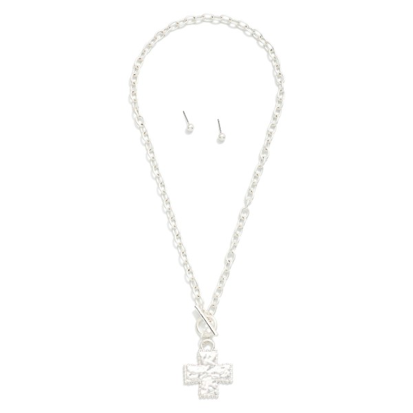 Chain Link Necklace Featuring Hammered Metal Plus Cross & toggle Clasp Pendant

- Includes Metal Tone Ball Stud Earrings 
- Approximately 16" L
