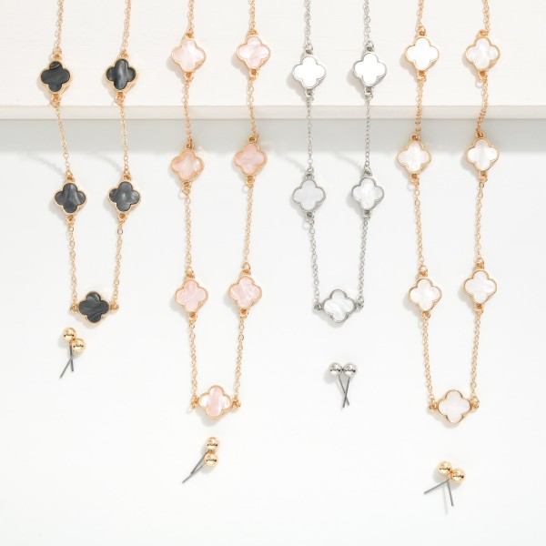 Chain Link Necklace Featuring Pearlescent Clover Stations 

- Metal Tone Ball Stud Earrings Included
- Approximately 16" L
- Extender 3" L