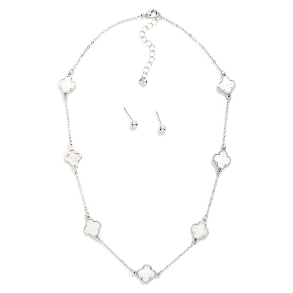 Chain Link Necklace Featuring Pearlescent Clover Stations 

- Metal Tone Ball Stud Earrings Included
- Approximately 16" L
- Extender 3" L