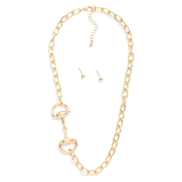 Chain Link Necklace Featuring Metal Tone Horsebit Stationary Pendant 

- Metal Tone Ball Stud Earrings 
- Approximately 18" L
- Extender 3" L