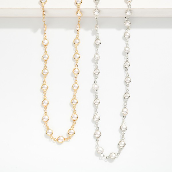 Long Chain Link Necklace Featuring Pearl & Metal Tone Stations 

- Approximately 32" L
- Extender 3" L