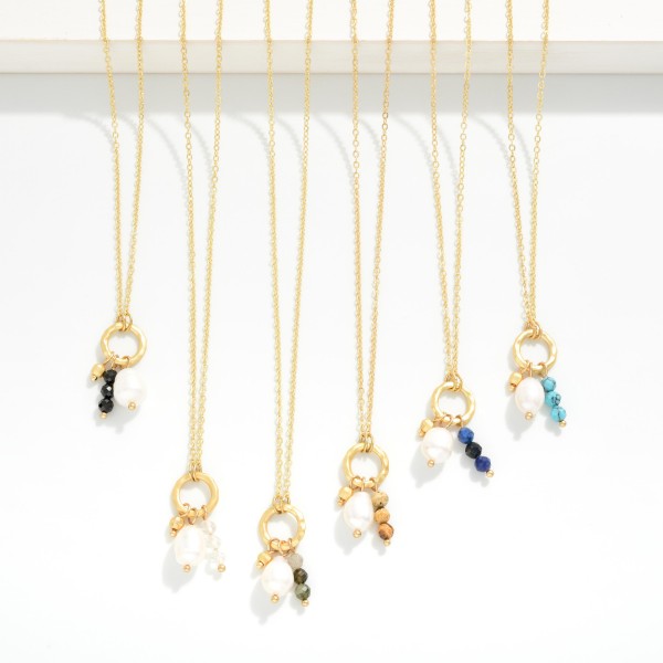 Chain Link Necklace Featuring Metal Tone Hoop Pendant With Stone & Pearl Charms 

- Approximately 14" L
- Extender 3" L