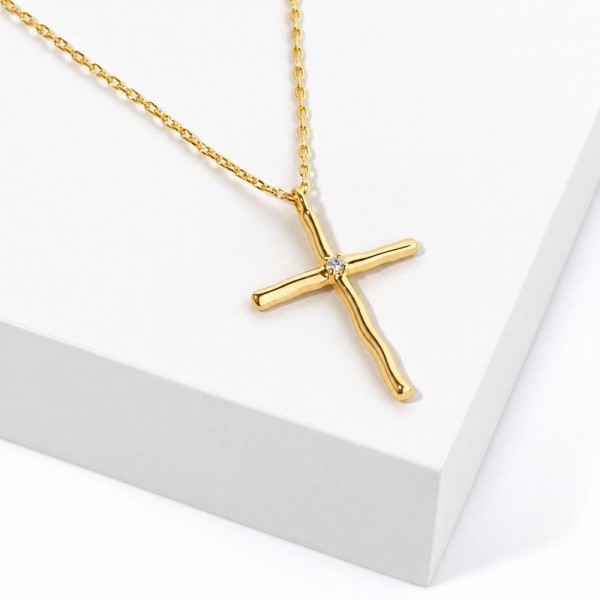 Organic Cross Pendant Necklace with softly curved, hand shaped arms and a sparkling cubic zirconia stone set at the center. The gold dipped pendant hangs on a dainty cable chain and comes on a Journey of Hope message card with an uplifting verse about faith. A meaningful gift for baptisms, first communions, graduations, birthdays, and anyone who needs a little encouragement. Faith inspired carded jewelry is a steady best seller and an easy impulse add on at checkout.