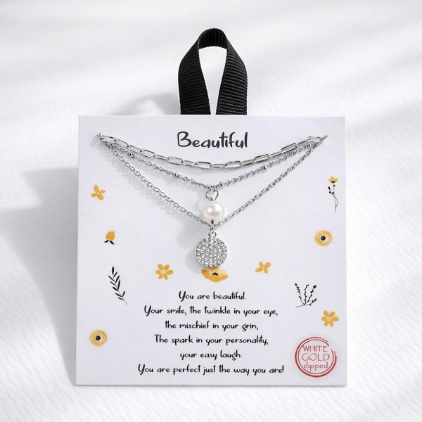 Layered Dainty Chain Link Necklace Featuring Freshwater Pearl & Rhinestone Pendants 

- Approximately 16" L
- Extender 2" L
- Hypoallergenic Brass Base
- 18K Gold Dipped
- Card: "You are beautiful. Your smile, the twinkle in your eye, the mischief in your grin, The spark in your personality, your easy laugh. You are perfect just the way you are!"