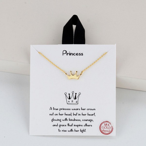 Dainty Chain Link Necklace Featuring Metal Tone Crown Pendant 

- Gold Dipped
- Hypoallergenic Brass Base
- Approximately 16" L
- Extender 2" L
- Made in Korea
- Lead & Nickel Free

Card Reads : "A true princess wears her crown not on her head, but in her heart, glowing with kindness, courage, and grace that inspire others to rise with her light."

