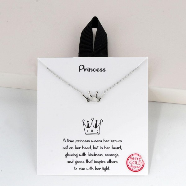 Dainty Chain Link Necklace Featuring Metal Tone Crown Pendant 

- Gold Dipped
- Hypoallergenic Brass Base
- Approximately 16" L
- Extender 2" L
- Made in Korea
- Lead & Nickel Free

Card Reads : "A true princess wears her crown not on her head, but in her heart, glowing with kindness, courage, and grace that inspire others to rise with her light."

