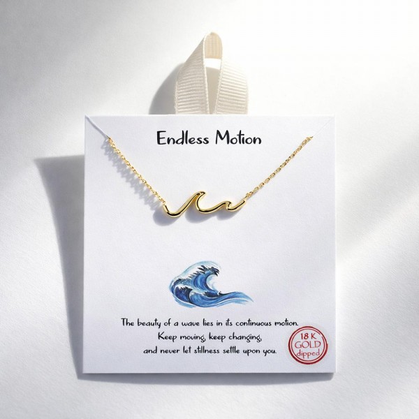 Dainty Chain Link Necklace Featuring Metal Tone Wave Stationary Pendant 

- Approximately 16" L
- Extender 2" L
- Hypoallergenic Brass Base
- 18K Gold Dipped
- Card: "The beauty of a wave lies in its continuous motion. Keep moving, keep changing, and never let stillness settle upon you."