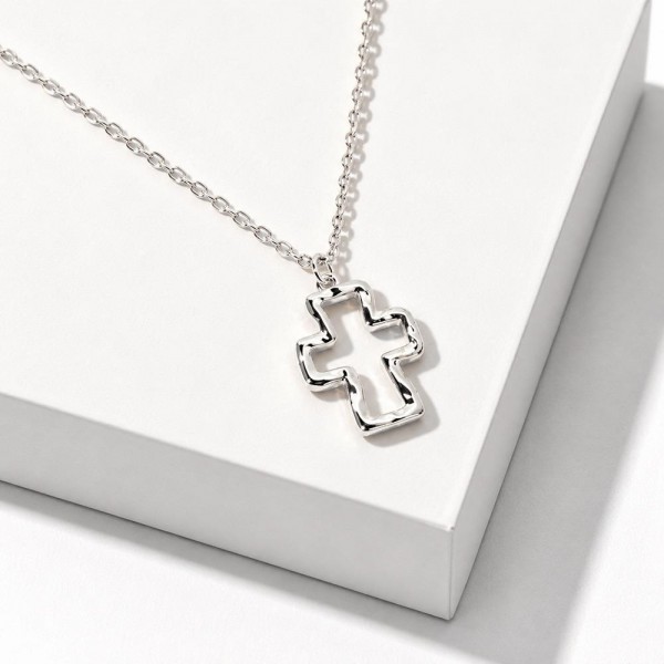 Open Cross Pendant Necklace with a hammered, organic outline that feels modern and meaningful. The gold dipped pendant hangs on a dainty cable chain and arrives on a Stillness Above All message card with a short verse about faith and peace. A lovely gift for baptisms, confirmations, Mother's Day, Easter, and everyday faith. Carded cross necklaces are a proven boutique seller and an easy grab and go gift at the register.
