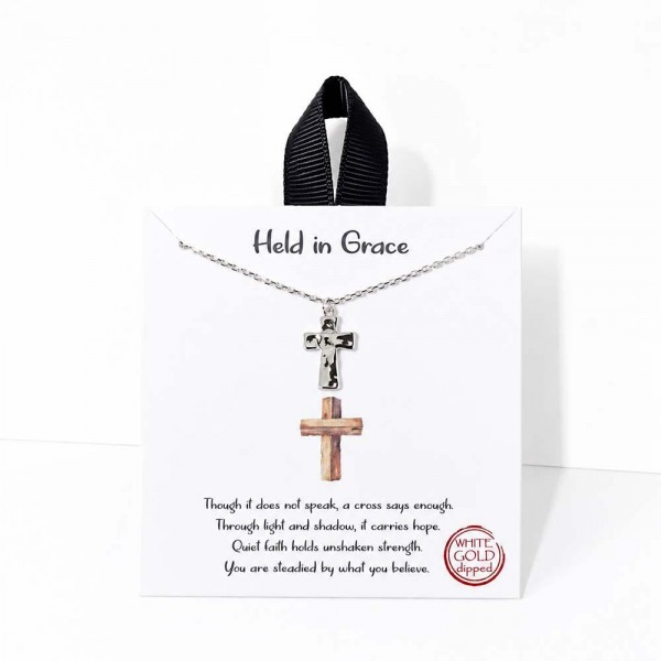 Dainty Chain Link Necklace Featuring Hammered Metal Cross Pendant 

- Approximately 16" L
- Extender 2" L
- Hypoallergenic Brass Base
- 18K Gold Dipped
- Card: "Though it does not speak, a cross says enough. Through light and shadow, it carries hope. Quiet faith holds unshaken strength. You are steadied by what you believe."