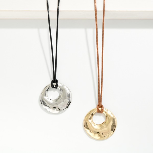 Waxed Cord Necklace Featuring Metal Tone Tapered Hoop Pendant 

- Approximately 16" L
- Extender 3" L