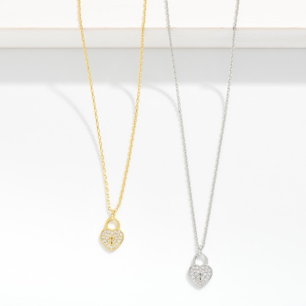 Dainty Chain Link Necklace Featuring Cubic Zirconia Heart Lock Pendant 

- Gold Dipped
- Approximately 15.5" L
- Extender 2" L