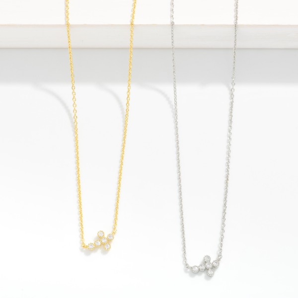 Dainty Chain Link Necklace Featuring Cubic Zirconia East West Cross Pendant 

- Gold Dipped
- Approximately 15.5" L
- Extender 2" L