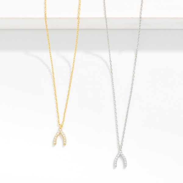 Dainty Chain Link Necklace Featuring Cubic Zirconia Wishbone Pendant

- Gold Dipped
- Approximately 15.5" L
- Extender 2" L