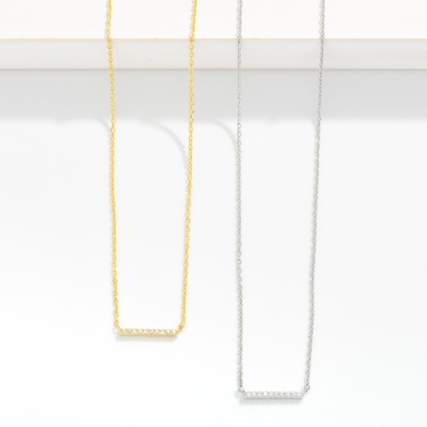 Dainty Chain Link Necklace Featuring Cubic Zirconia Bar Pendant

- Gold Dipped
- Approximately 15.5" L
- Extender 2" L