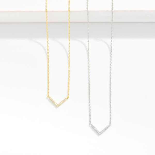Dainty Chain Link Necklace Featuring Cubic Zirconia Arrow Pendant 

- Gold Dipped 
- Approximately 15.5" L
- Extender 2" L