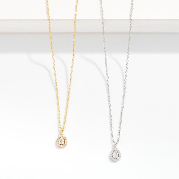 Dainty Chain Link Necklace Featuring Cubic Zirconia Teardrop Pendant

- Gold Dipped
- Approximately 15.5" L
- Extender 2" L