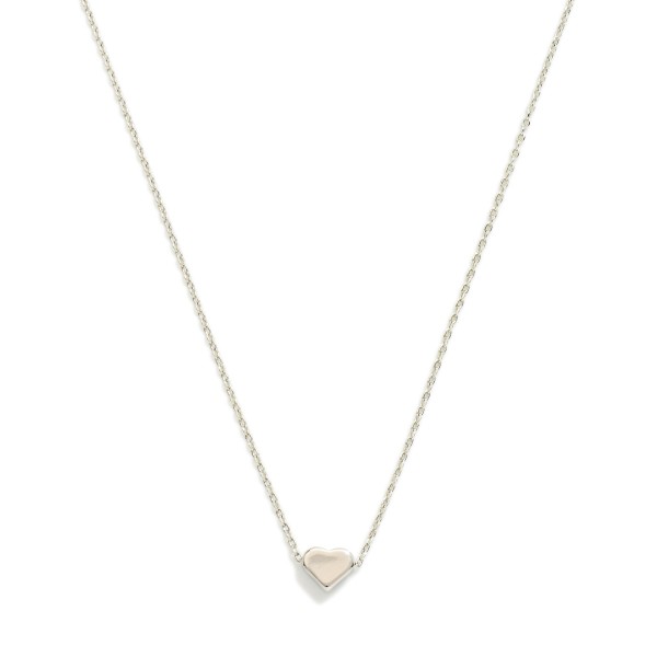 Dainty Chain Link Necklace Featuring Metal Tone Heart Pendant 

- Gold Dipped 
- Approximately 15.5" L
- Extender 2" L