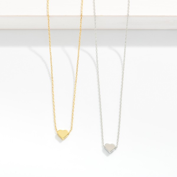Dainty Chain Link Necklace Featuring Metal Tone Heart Pendant 

- Gold Dipped 
- Approximately 15.5" L
- Extender 2" L