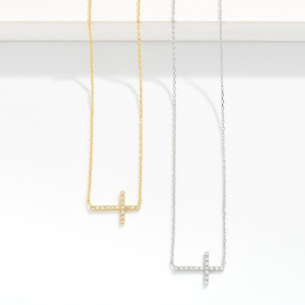 Dainty Chain Link Necklace Featuring Cubic Zirconia East West Cross Pendant 

- Gold Dipped 
- Approximately 15.5" L
- Extender 2" L