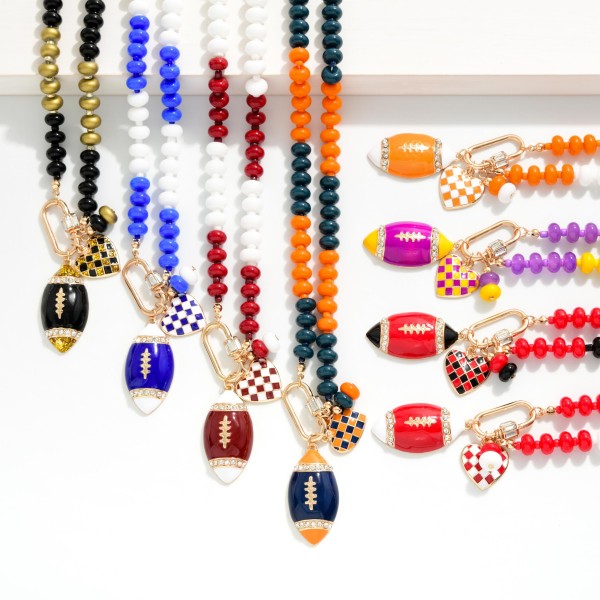 Game Day Beaded Necklace Featuring Enamel Checkered Heart & Football Pendant 

- Approximately 14" L
- Extender 3" L