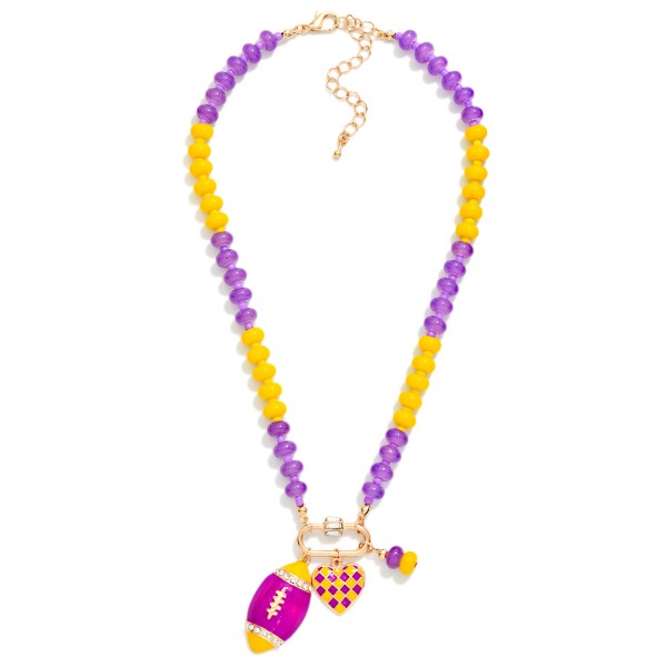 Game Day Beaded Necklace Featuring Enamel Checkered Heart & Football Pendant 

- Approximately 14" L
- Extender 3" L