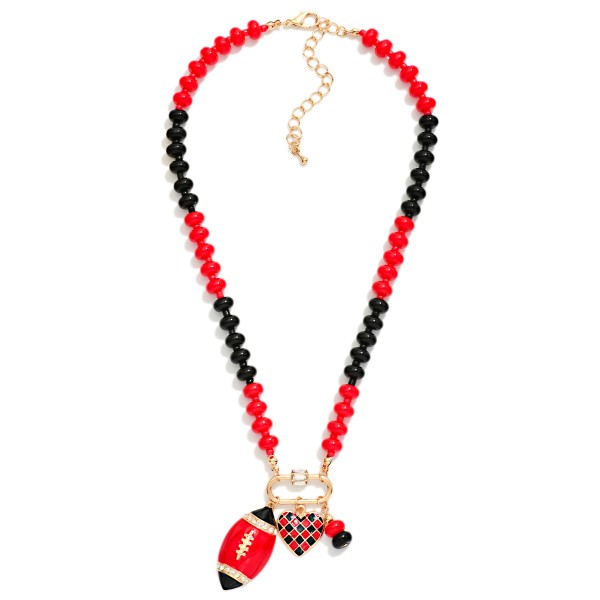 Game Day Beaded Necklace Featuring Enamel Checkered Heart & Football Pendant 

- Approximately 14" L
- Extender 3" L