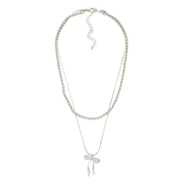 Layered Chain Link & Beaded Metal Necklace Featuring Bow Pendant 

- Approximately 16" L
- Extender 2" L
