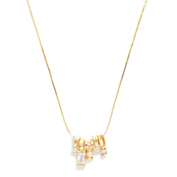 Pearl and Crystal Charm Cluster Necklace featuring five mini sliding charms, including a baguette crystal, round crystal drops, and faux pearl accents, gathered at the center of a fine snake chain. The clustered charms move freely for a playful, collected look that feels personal and modern. A lovely gift for birthdays, bridesmaids, and anyone who loves layered sparkle. Charm cluster necklaces are a hot trend, and this one delivers a curated look in a single piece.