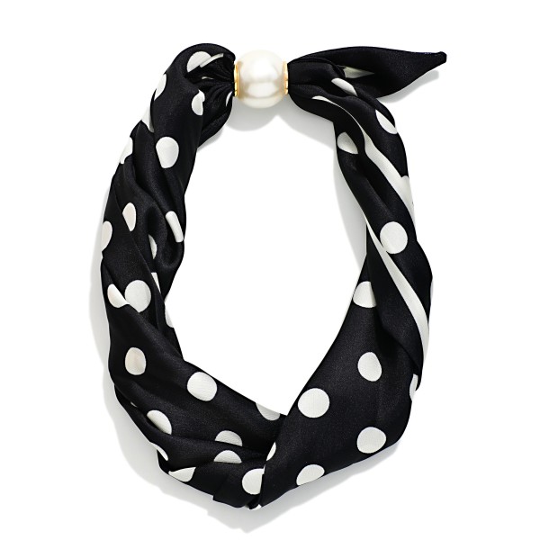 Printed Scarf Necklace with a silky scarf knotted into a playful bow and anchored by a polished faux pearl accent. The pre styled design adds instant charm to sweaters, blouses, jackets, and simple dresses. No tying required, so customers get a perfectly styled neckline in seconds. A fun, giftable accessory at an easy price point that stands out on any display and pairs well with pearl studs for an add on sale.