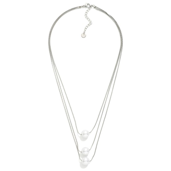 Layered Snake Chain Necklace Featuring Pearl Stationary Pendants 

- Stainless Steel 
- Water Resistant
- Approximately 16" L