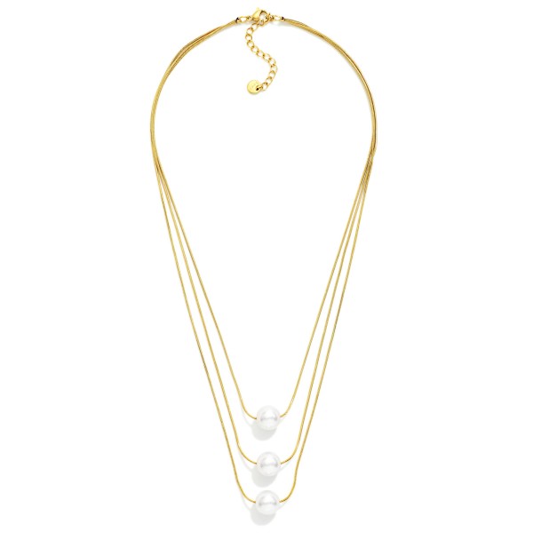 Layered Snake Chain Necklace Featuring Pearl Stationary Pendants 

- Stainless Steel 
- Water Resistant
- Approximately 16" L
