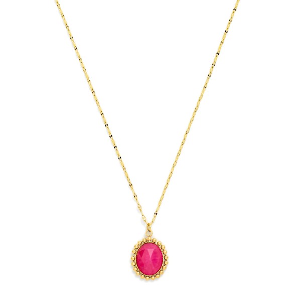 Dainty Lip Chain Necklace Featuring Faceted Acetate Oval Pendant With Metal Tone Studded Border 

- Stainless Steel 
- Water Resistant 
- Approximately 15.5" L
- Extender 2" L 