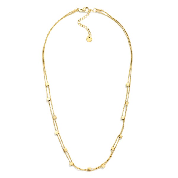 Layered Snake Chain Necklace Featuring Metal Tone Square Stations 

- Stainless Steel 
- Water Resistant 
- Approximately 14" L
- Extender 2" L
