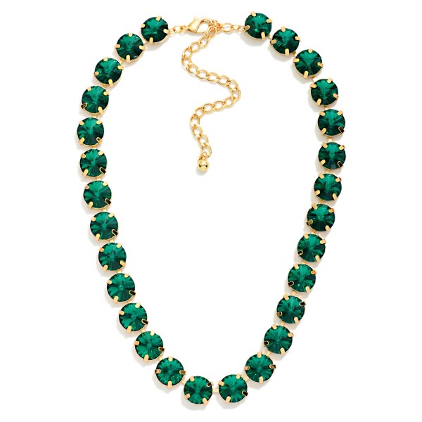 Crystal Cup Chain Necklace lined with large round glass crystals in polished prong settings for bold, glamorous sparkle. The uniform stone design looks elegant on its own and layers beautifully with pendants and fine chains. A lobster clasp and extender chain allow an easy, adjustable fit. Crystal statement necklaces are a holiday essential and sell quickly for events, gifting, and New Year's celebrations.
