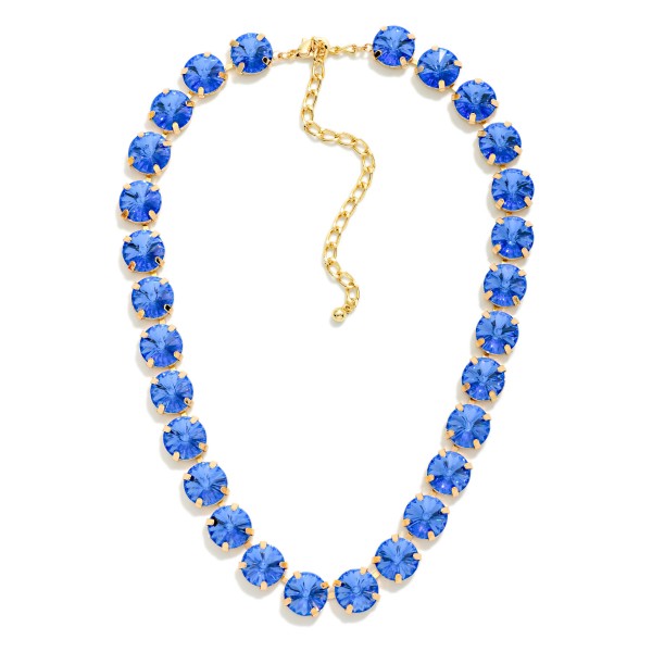 Crystal Cup Chain Necklace lined with large round glass crystals in polished prong settings for bold, glamorous sparkle. The uniform stone design looks elegant on its own and layers beautifully with pendants and fine chains. A lobster clasp and extender chain allow an easy, adjustable fit. Crystal statement necklaces are a holiday essential and sell quickly for events, gifting, and New Year's celebrations.