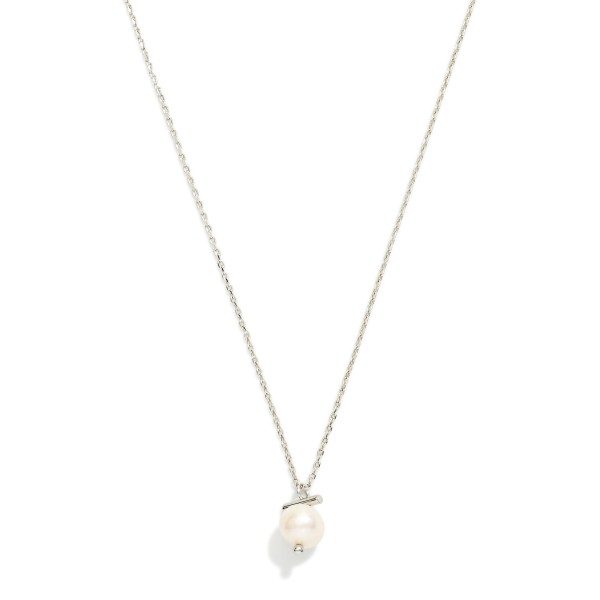 Single Pearl Drop Pendant Necklace with a lustrous faux pearl suspended from a delicate bail on a fine twisted rope chain. Minimal and refined, it adds instant polish to everyday outfits and layers easily with initial and charm necklaces. A timeless gift for brides, bridesmaids, graduates, and moms. Simple pearl pendants are perennial best sellers that suit every age group.