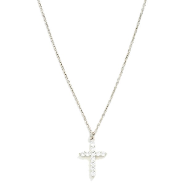 Cubic Zirconia Cross Pendant Necklace featuring a slender cross set end to end with sparkling round stones on a fine, dainty chain. The delicate scale makes it an easy everyday piece that layers beautifully with initials, charms, and longer chains. A meaningful gift for baptisms, confirmations, Easter, and Christmas. Timeless faith jewelry like this stays in steady demand year round, making it a dependable reorder for any boutique.