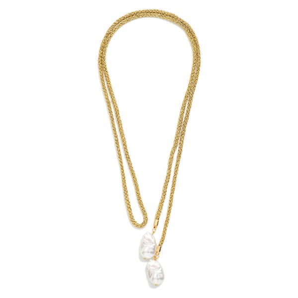 Pearl Lariat Necklace with a textured chain finished by a baroque faux pearl at each end. Wear it knotted, looped or draped open for a different look every time. An elegant pick for weddings, holiday parties and dressing up a simple sweater or V neck. Versatile lariats feel like two necklaces in one, which makes them an easy sell.