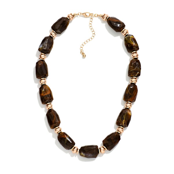 Chunky Nugget Bead Necklace with oversized faceted stone look nuggets separated by polished metal spacer beads. The bold, organic shapes make an easy statement at the collarbone, and the extender adjusts the fit. Perfect for fall sweaters, holiday parties and dressing up a plain tee. A chunky statement necklace at a price that makes it an easy impulse buy.