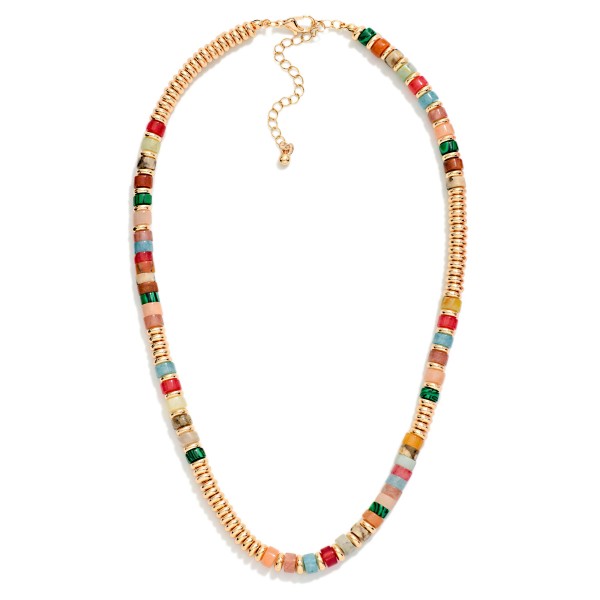 Heishi Bead Necklace strung with polished metal disc beads and accents of stone look heishi spacers for a stacked, beachy texture. It lays flat at the collarbone with an extender for easy sizing and layers perfectly with pendants and chains. A versatile everyday piece for resort wear, weekends and casual workwear. Heishi styles stay in demand for boutiques year round.