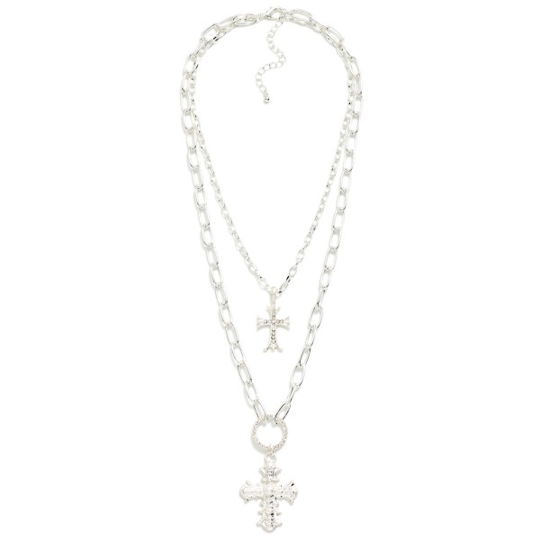 Layered Cross Necklace with a fine chain holding a sparkling cross pendant over a chunky paperclip chain finished with a front toggle closure. The two strands come already layered for an instant stacked look, with an extender for easy sizing. Perfect for Christmas, Easter, church and everyday faith style. A trend right mix of chunky and delicate that boutique shoppers love.