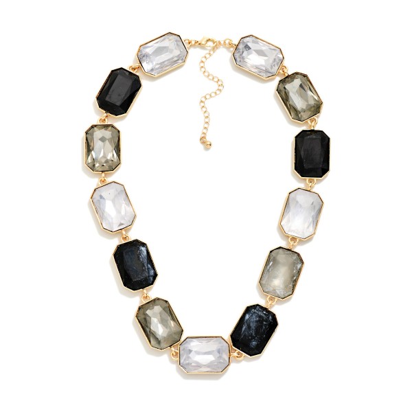 Emerald Cut Crystal Statement Necklace made of oversized faceted stones linked stone to stone in polished prong settings. The bold collar silhouette sits right at the neckline and finishes with a lobster clasp and extender. A showstopper for holiday parties, galas, weddings and New Year's Eve. Big glam at an approachable price, perfect for front table displays that stop shoppers in their tracks.